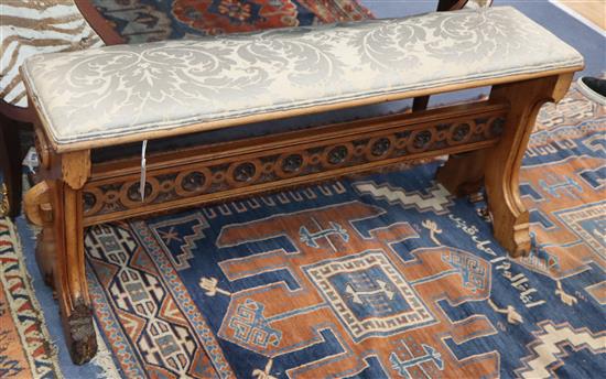 A 19th century Italian walnut Gothic revival stool W.104cm